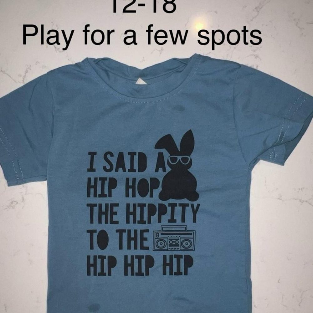 Blue kids t-shirt with black graphic of a bunny with glasses and a boombox, with